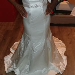 New wedding dress with tags attached
